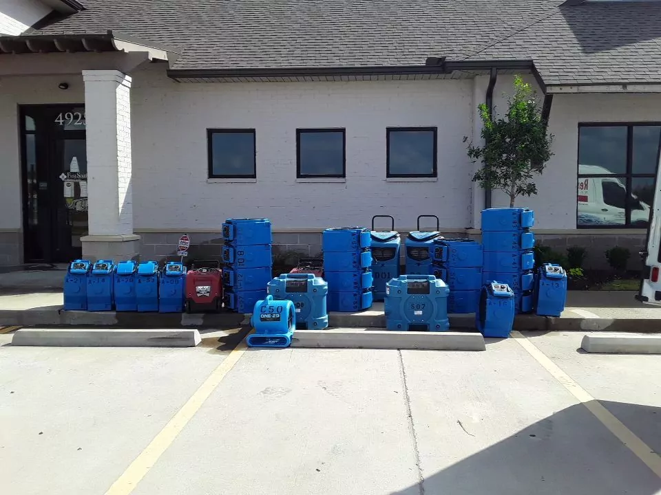 Restoration Pro's water damage restoration equipment staged and ready for pickup after a water loss in Lafayette, LA